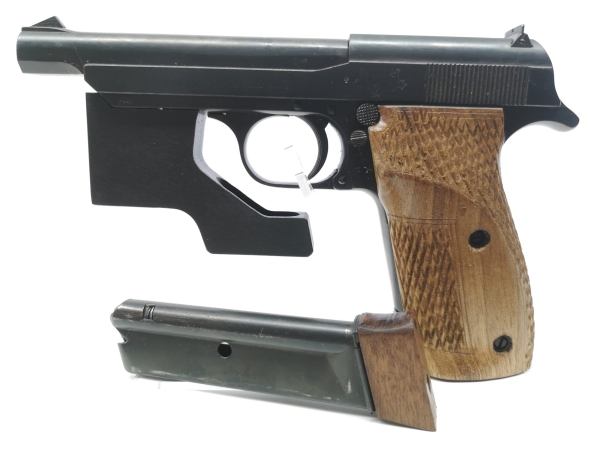 halbautomatische Pistole Norinco - TT Olympia - Note 2  - chin. Nachbau der TT Olympia Pistole, guter Gesamtzustand, mit Laufgewicht und 2tem Magazin, Holzgriffschalen, guter Pflegezustand, verstellbare Kimme, Laufgewicht, voreintragspflichtig