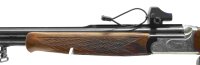 Bockb&uuml;chsflinte Antonio Zoli - Corona - Note 2  - Bockb&uuml;chsflinte von Antonio Zoli, Mod. Corona, mit Zweischloss-Handspannsystem, Nu&szlig;baumholz, bayrische Backe, 1/1 gechokter Flintenlauf, nitrierte Stahlbask&uuml;le mit Arabeskengravur, R&uuml;ckstecher am B&uuml;chsabzu
