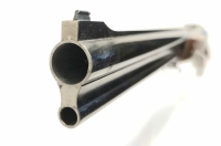 Bockbüchsflinte Frankonia - de Luxe (Sabatti) - Note 3  - schöne Bockbüchsflinte von Frankonia Jagd, produziert von Sabatti, Modell de Luxe, mit schöner gravierter Basküle mit Jagdmotiven, Klappkimme, Sicherung auf dem Kolbenhals, Rückstecher (französisch