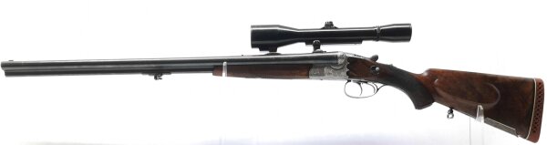 Drilling Merkel - ohne - Note 3  - sch&ouml;ner schmaler seltener Suhler-Drilling, Bechu&szlig; 1957, Abzugssicherung linksseitig, Umschalter Schrot/Kugellauf, Klappkimme, mit Dolomit Glas, 6x42/49 unbeleuchtet, ventilierte Gummischaftkappe, Spannanzeige f&uuml;r die L&auml;u