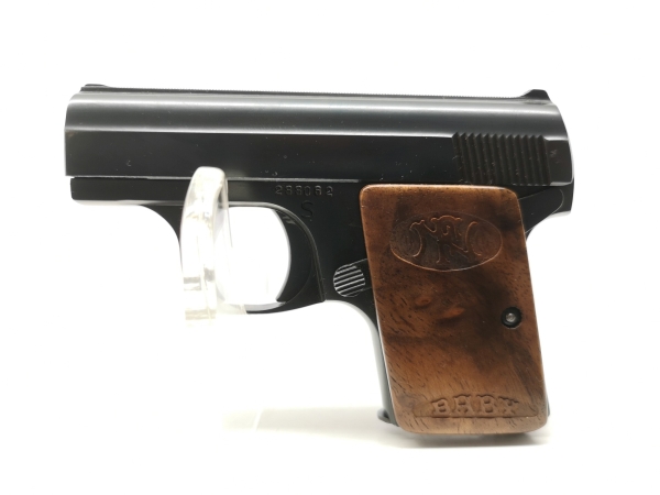 halbautomatische Pistole FN - Baby - Note 2  - belgische "Baby"-Taschenpistole mit Bakelitgriffschalen, Kal. 6,35mm Browning, Bakelitgriffschalen im Holzdesign mit FN Logo plus Schriftzug "Baby", linksseitige Sicherung, Steckmagazin, optisch und technisch