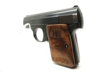 halbautomatische Pistole FN - Baby - Note 2  - belgische "Baby"-Taschenpistole mit Bakelitgriffschalen, Kal. 6,35mm Browning, Bakelitgriffschalen im Holzdesign mit FN Logo plus Schriftzug "Baby", linksseitige Sicherung, Steckmagazin, optisch und technisch
